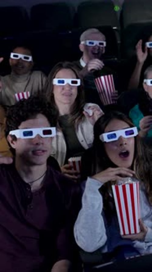 Audience Wearing 3d Glasses Watching Gripping Movie in Cinema