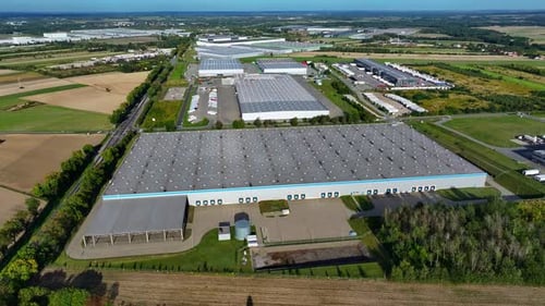 Exploring a modern logistics center with drone views of warehouse operations