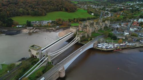 Bridge Crossing River to Famous Conwy Castle in North Wales, UK - Aerial