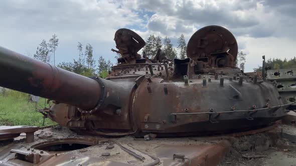 Part of a burnt Russian tank, muzzle. Detail of iron on a rusty armored ...