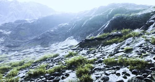 Aerial Flyover of Snowy Rocky Mountain Landscape