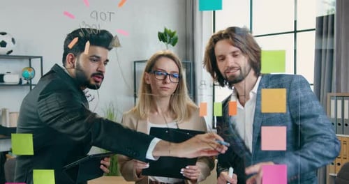 Office Colleagues Collaborating on Project