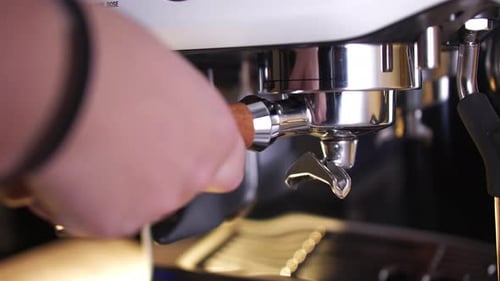 Attaching Portafilter to Espresso Machine for Coffee Making