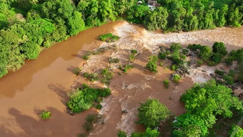 Aerial view: Waterfall flood in motion.