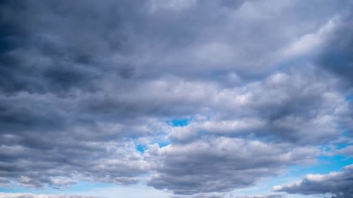 Dark Clouds Timelapse on Blue Sky