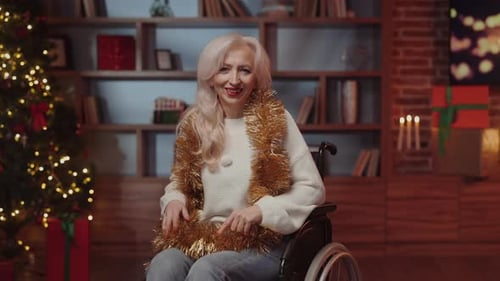 Happy Woman in Wheelchair at Christmas Time
