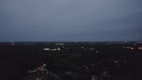 An aerial view of a city at night. Amazing panorama views on the night city