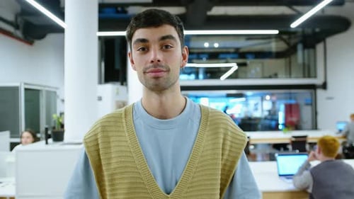 Portrait of Young Handsome Businessman in Casual Outfit in the Office