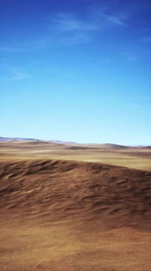 Barren Plain Under Blue Sky