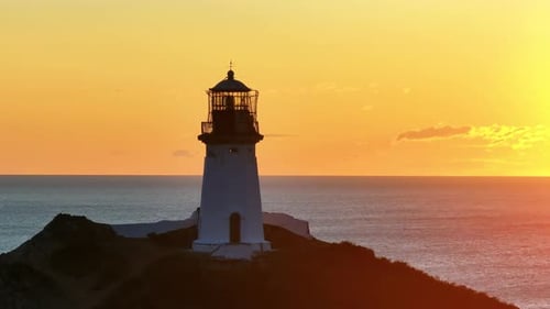 Beacon of the Sea A Majestic Lighthouse Illuminating the Ocean Waves