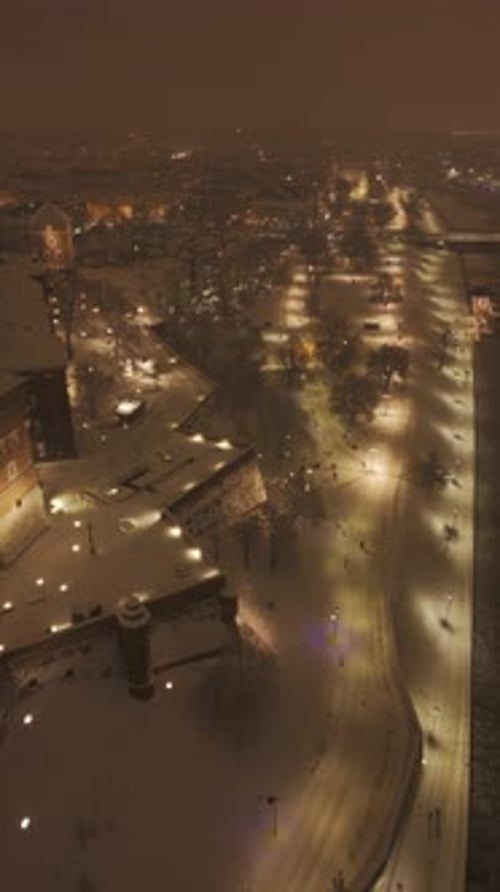 Evening Winter Flight Along Vistula River Past Wawel in Krakow