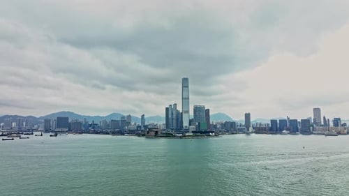 A large body of water with a city in the background