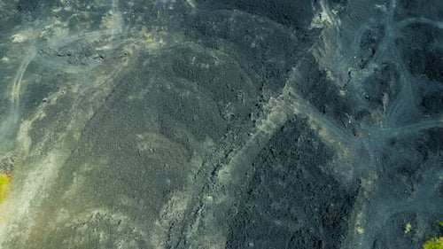 Aerial Top Down View of Black Lava on Volcano