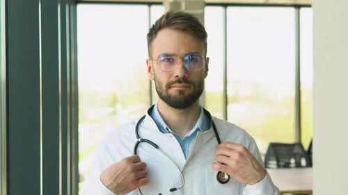 Doctor in Lab Coat with Stethoscope Smiling