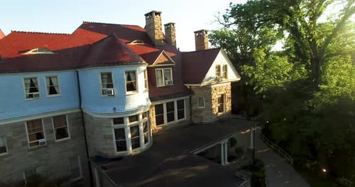 Aerial turning view of Graceland Inn and Robert C. Byrd Center for Hospitality & Tourism on the camp