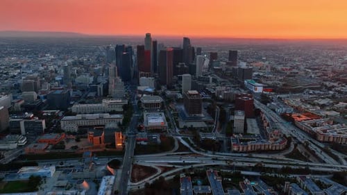 Vast view of Los Angeles, California, US at twilight. Skyscrapers in the downtown in the center.