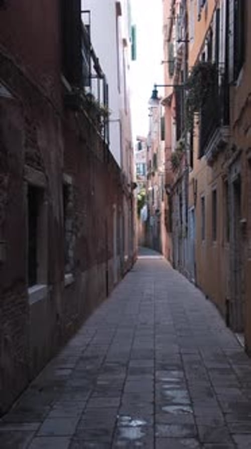 Vertical of Empty Narrow Cozy Street in Venice