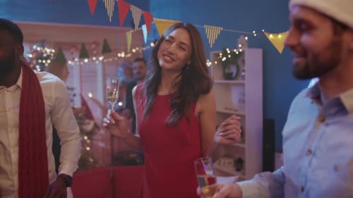Friends Celebrate Christmas Holiday Party with Champagne
