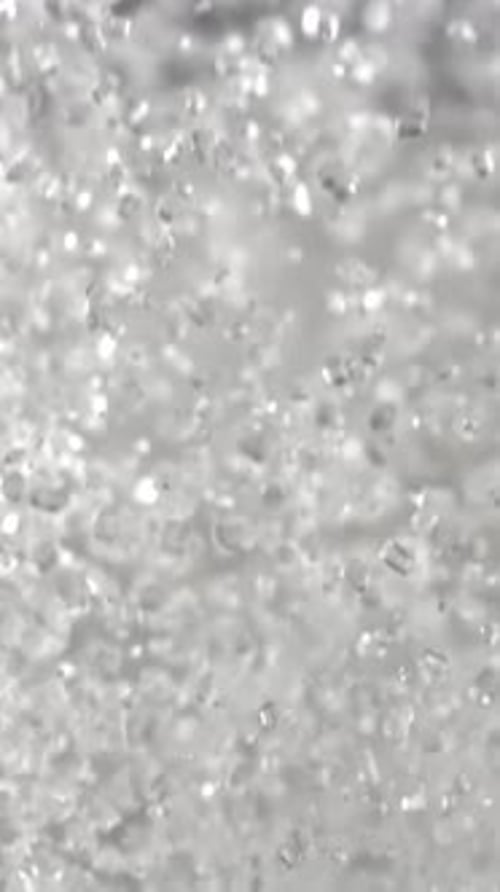 Sugar Flies Up and Down Filmed on a Highspeed Camera at 1000 Fps