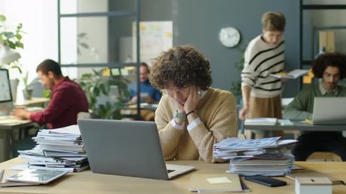 Timelapse of Overworked Businesswoman in Office
