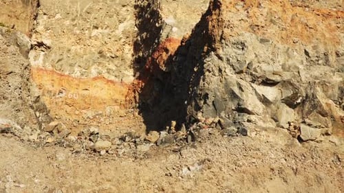Exposed Rock Hillside During Daytime