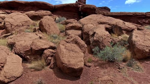 Scenic View Of Red Rock Formations In The Desert Landscape Of Utah On A Sunny Day. tilt-up