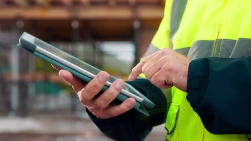 Tablet, hands and architect at construction site for development, planning project or schedule