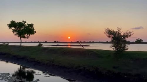 Golden Sunset Reflecting on a Peaceful Lake