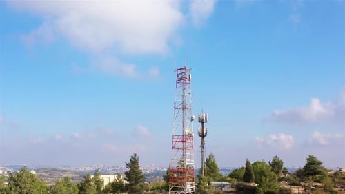 Aerial footage Close to Radio and cellular Antenna With blue sky