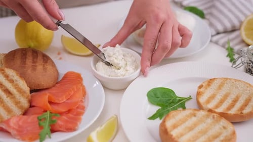 Making Salmon Fillet Sandwich with Cream Cheese at Domestic Kitchen