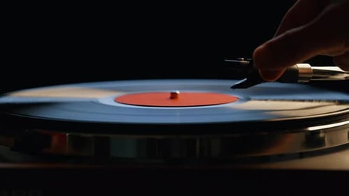 Vinyl Record Spinning as Needle is Placed on Record