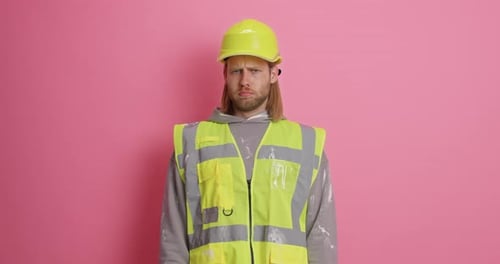 Construction Worker Reacts with Shock and Disapproval