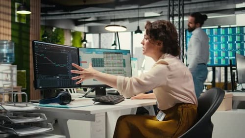 Frustrated Businesswoman Struggling with a Stock Crash Downtrend