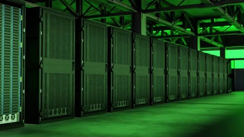 Server farm in warehouse with flashing green light, pullback shot