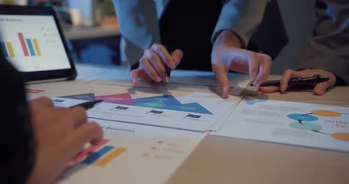 Business Team Reviewing Financial Data in Office