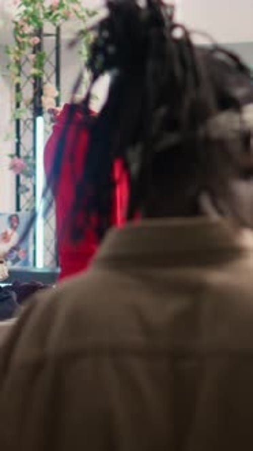 Vertical Video Worker Changing Shop Mannequin Clothes