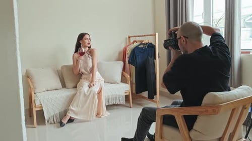 Woman Model Posing for Photographer in Studio