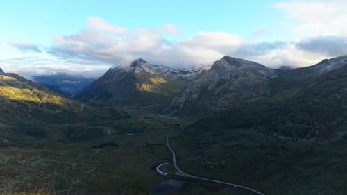 Breathtaking Panoramic Aerial View of Swiss Alps at Sunrise