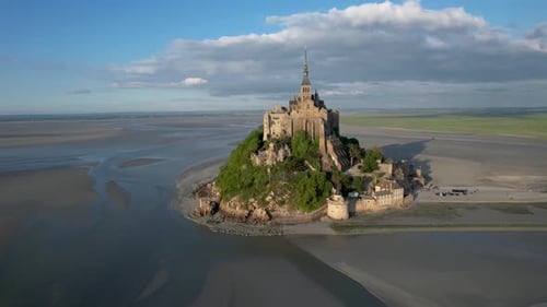 Mont Satin Michel Abbey, Normandy France at low tide, Aerial Rotating left