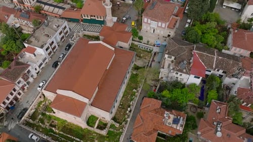 Birds Eye Cinematic Shot of Mosque Building in Residential Urban Borough Traditional Buildings in