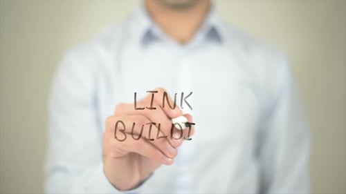 Link Building, Man Writing on Transparent Screen