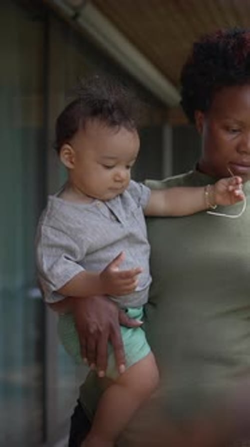 A Heartwarming Tender Moment Shared Between a Loving Mother and Her Cherished Child