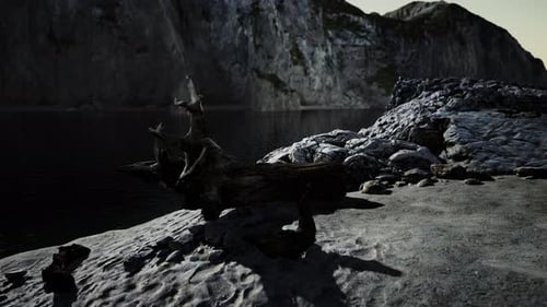 Black Sand Beach Hidden Between Blurred Volcanic Rocks