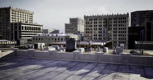 Urban Rooftop View Overlooking City Buildings and Structures During Daylight