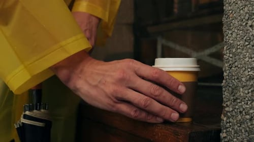 Business Man Tourist Person with Umbrella and Raincoat on Rainy European City Street Lights