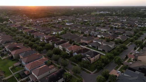 Aerial footage of an American town in Florida, with beautiful residential architecture surrounded by
