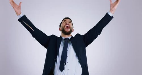 Excited, money rain and business man in studio for payment bonus, competition and lottery winner