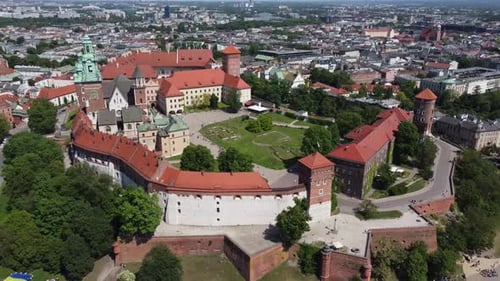 Flyover of the Wawel Royal Castle Cathedral on the Vistula (Wisła) River - Krakow, Poland, a Polish