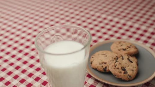 Glass of Milk and Chocolate Chip Cookies