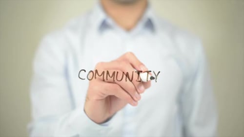 Writing the Word Community on a Clear Surface